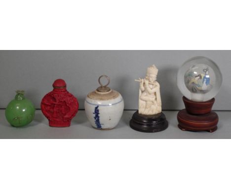 Oriental snuff bottles, small lidded bottle a figurine and glass sphere on stand, 4.9cm - 10cm high