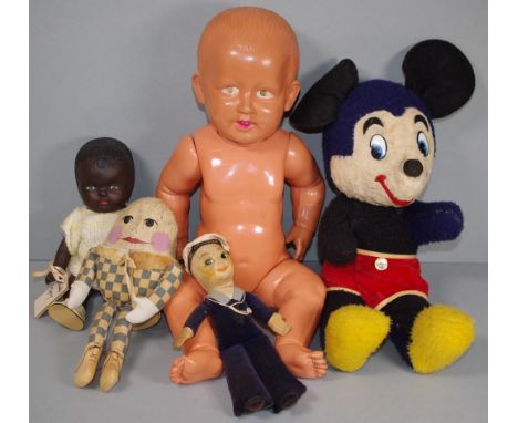 Five vintage dolls comprising a large celluloid boy doll, 40cm tall approx., a musical Disney Mickey Mouse, 'Orcades' sailor 