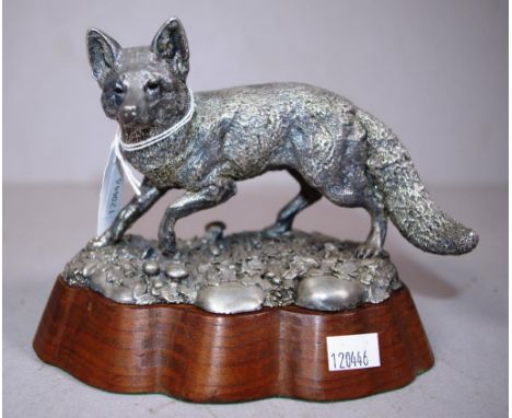 Sterling silver fox figurine on a timber stand hallmarked Birmingham 1994, height 12.5cm approx