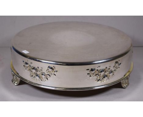 Vintage silver plate wedding cake stand embossed and engraved decoration, tri-footed. Diameter 11cm approx. Diameter 36cm app