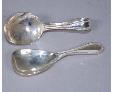 Two reproduction caddy silver spoons tested as 925