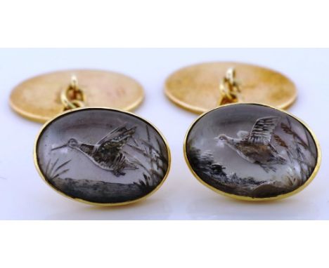 Hand painted rock crystal and gold cufflinks carved reverse quartz game birds with Mother of Pearl backing. Set in a 18ct yel