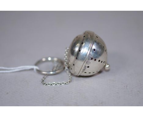 Vintage sterling silver tea infuser marked 'Sterling,'  on sterling silver chain. Weight 16grams approx (total).