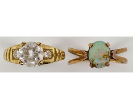 Two vintage 9ct gold rings one decorative set with a glass gemstones marked 375 approx 2.9 grams, ring size N.  Another opal 