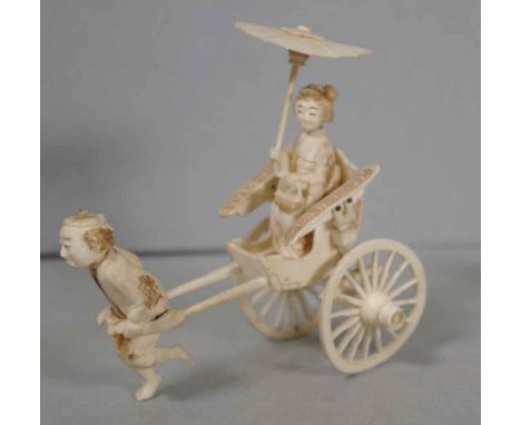 Japanese Meiji (1868-1912) carved ivory okimono of a lady in a rickshaw, 10cm high approx. Ex: Private collection Sydney. Thi