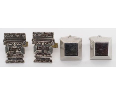 Two pairs of silver cufflinks of truncated square pyramid form with wingback fasteners marked R Z0 approx 18 grams. Aztec fig