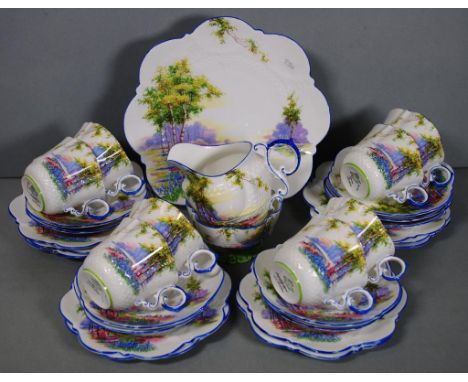 Twenty seven piece Aynsley tea set with landscape decoration, marked B2044, including 8 cups, saucers, and plates, (together 