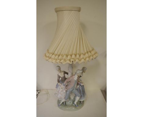 Large Lladro "La Tarantella" figural lamp depicting two ladies and a gentleman dancing around a Corinthian column, in traditi