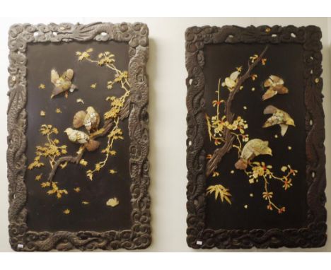 Pair of large Oriental decorative panels with carved dragon frame, the centre panel decorated with birds on a tree. Applied d