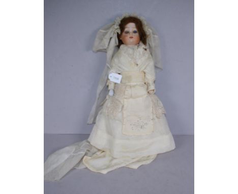 Antique bisque ceramic head bride doll in original bridal dress, including underwear, ceramic head and hands, with sleeping e