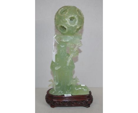 Chinese Longevity God carved jadeite figurine on timber stand & with puzzle ball, carved 29cm high (incl. stand) approx.