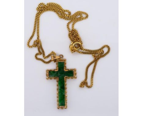 Gold and jade cross and chain cross marked 14k. approx 2 grams weight .Chain marked 750 Italy approx  3.5 grams weight.