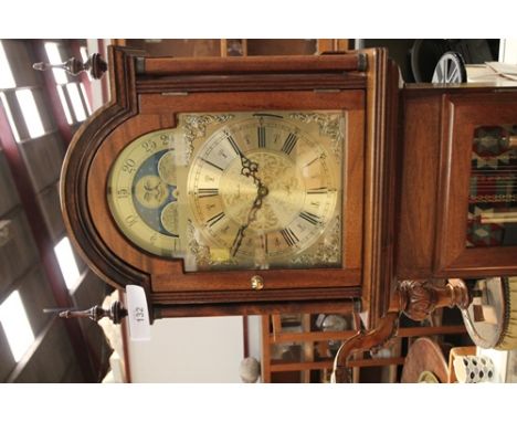A reproduction mahogany finish long case clock with Westminster chimes and 3 weights, size 192 x 46 x 25cm
