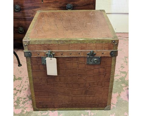 TIMOTHY OULTON TRUNK, brown leather coated, brass bound, complete with carrying handles, 60cm H x 58cm W x 56cm D. 