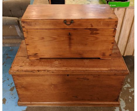 PINE TRUNK, 103cm W x 52cm D x 49cm H, Victorian with rising lid and a smaller one 76cm W x 33cm D x 42cm H. (2) 