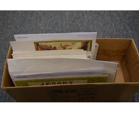 A box containing a collection of Jersey first day covers etc.