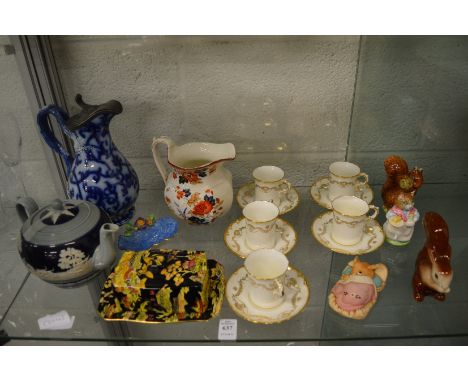 A collection of decorative porcelain and similar items to include a Spode teapot, Beswick figures etc.
