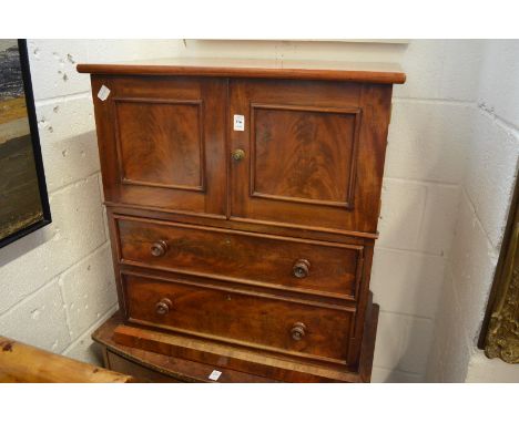 A 19th century mahogany commode.