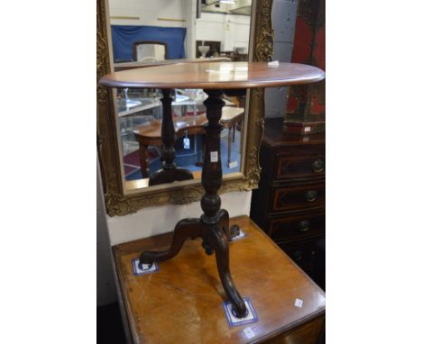 A tripod table.