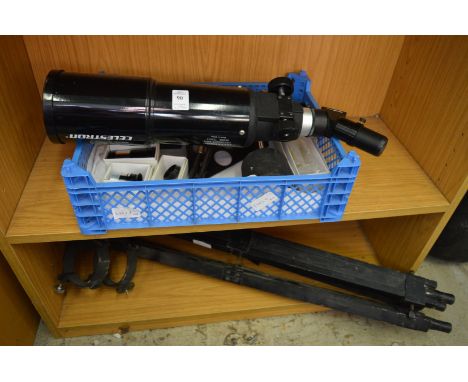 A telescope with tripod stand.
