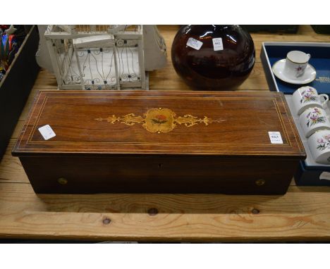 A Victorian music box playing eight airs.