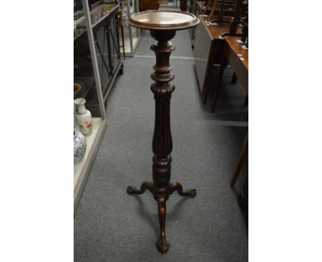 A mahogany tripod jardiniere stand.