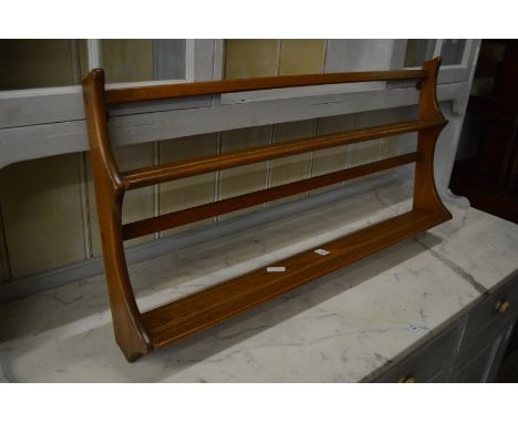 An Ercol plate rack.