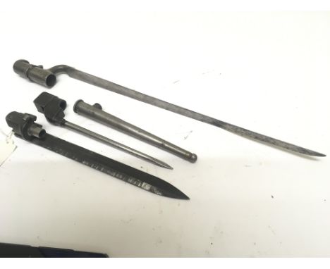 A 19th century spike socket bayonet with Middle Eastern marks a pig stick bayonet and scabbard and one other bayonet (3)