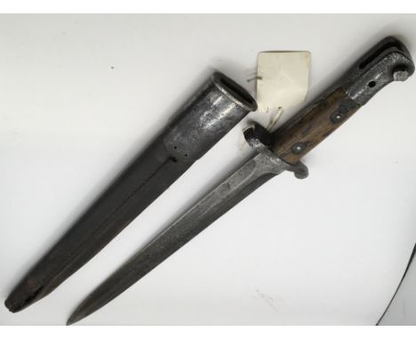 A 1907 British Bayonet made by Wilkinson the blade with other marks leather scabbard slightly split. Length 46cm