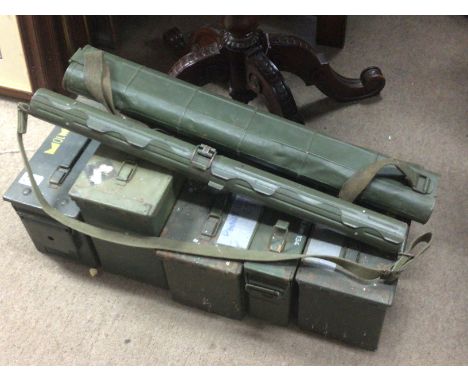 A collection of Military ammunition boxes of mixed size and shape.