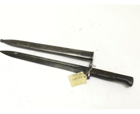 A bayonet possible a 1908 Enfield bayonet with metal scabbard. 45cm