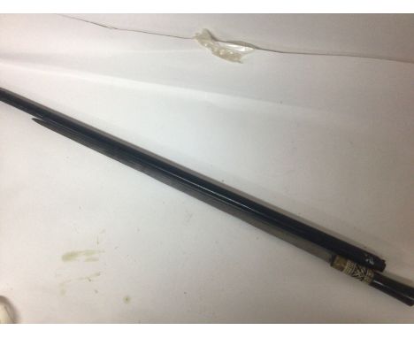 A Vintage Indian sword stick ebony and with brass mounts.