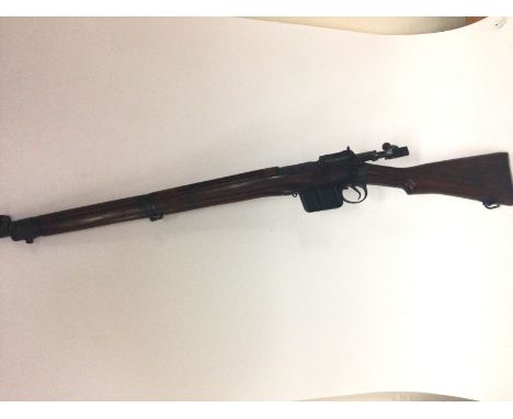 A Vintage Enfield Rifle caliber bolt action with standard Sterling magazine full length stock cal 7.62mm The gun in good func
