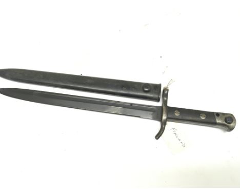 A Bayonet M/27 pattern the blade with makers stamp Fiskars with a metal scabbard. Length