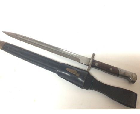 A K98 type bayonet unmarked with a hook quillion stamped 2961 1 leather and brass scabbard leather frog and in very good cond
