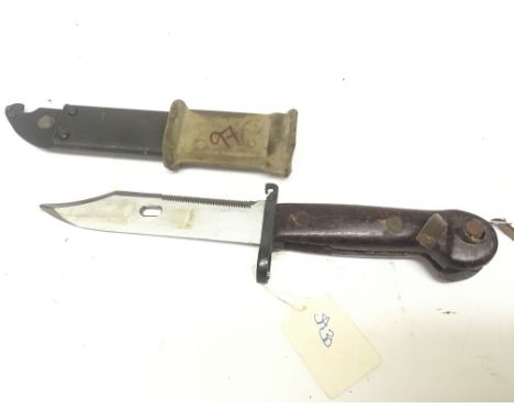 An AK47 Kalashnikov bayonet the scabbard with wire cutter end.