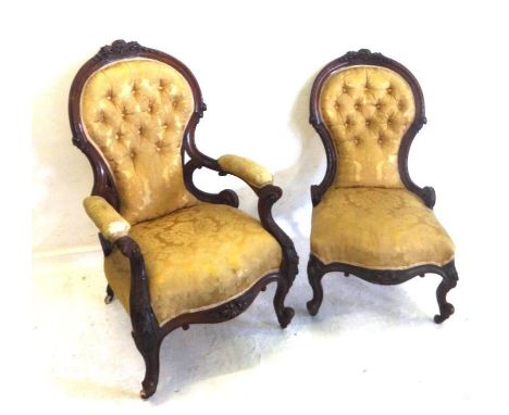 C19th Victorian Gentlemans Armchairs with raised arm pads on cabriole front supports, well carved show-wood frame, button bac