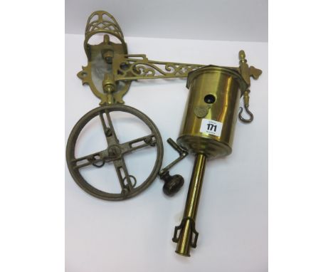 BRASS ROASTING SPIT, a Salter roasting spit with original bracket fitting and key