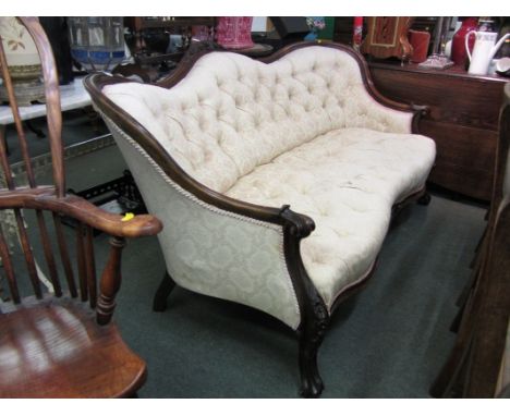 VICTORIAN SPOON BACK DOUBLE SETTEE, a carved mahogany framed serpentine fronted and button back settee on floral carved cabri