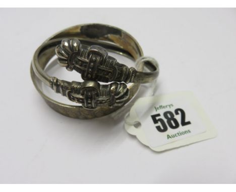BANGLES, hinged silver bangle with engraved decoration, together with a silver slave style bangle
