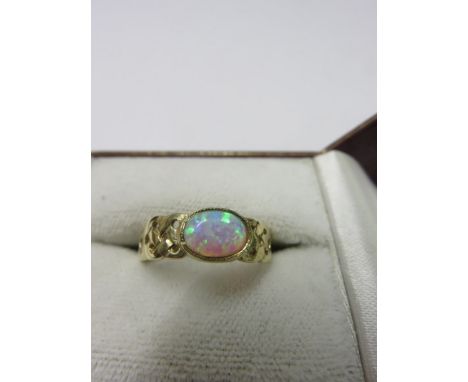 CELTIC OPAL RING, 9ct yellow gold celtic ring, set an oval ring, size P