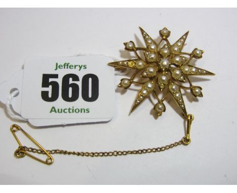 PEARL BROOCH, 10ct gold star shaped brooch encrusted with pearls