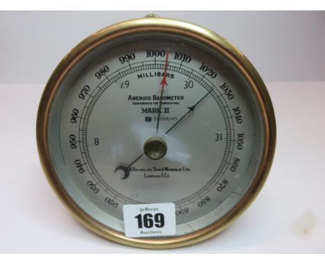 ANEROID BAROMETER, a brass cased barometer by T Reynolds, mark II model