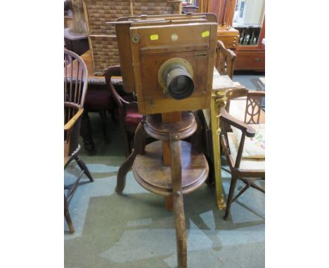 EARLY CAMERA,  a Studio full plate mahogany and brass tripod base camera