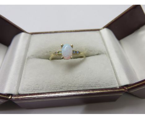 OPAL RING, 9ct yellow gold ring set an oval opal, size N/O