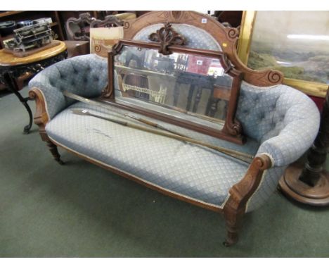 VICTORIAN SETTEE, blue button back twin scroll arms, settee with carved cresting and tapering turned legs