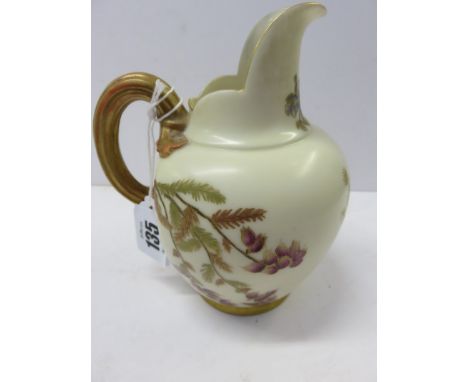 ROYAL WORCESTER, gilt and floral decorated water jug on a peach ground, pattern no. 1094, with purple mark to base 5.5" high 