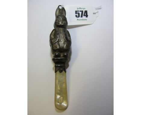 CHILD'S RATTLE, child's mother-of-pearl handled HM silver rattle in the form of of a rabbit, 4.5" 