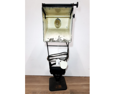 A VINTAGE MAGNIFYING LAMP