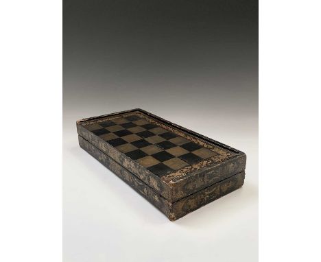 A Chinese export black lacquered folding games board, 19th century, for chess and backgammon, width 42.3cm,Condition report: 